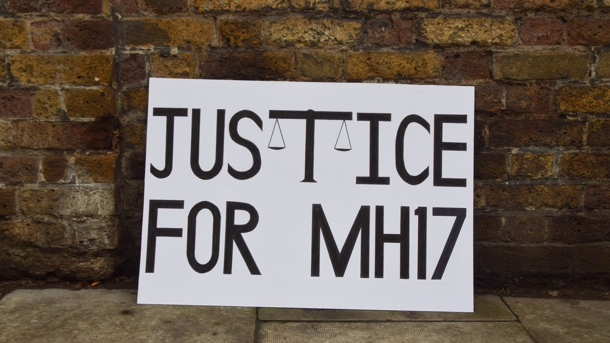 Un banner în care se cere justiție pentru doborârea zborului MH17. Imagine cu caracter ilustrativ Foto: Profimedia