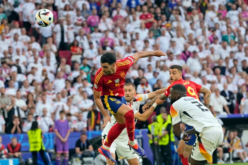 Spain's Mikel Merino (6) scores his side's second goal during a quarter final match between Germany and Spain at the Euro 2024 soccer tournament in Stuttgart, Germany, Friday, July 5, 2024.,Image: 887544224, License: Rights-managed, Restrictions: This content is intended for editorial use only. For other uses, additional clearances may be required., Model Release: no