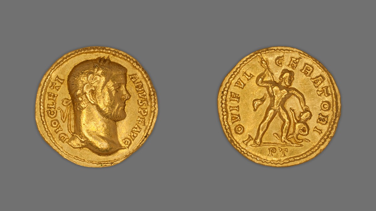 Aureus (monedă) cu efigia împăratului Dioclețian, 294-305, emis de Dioclețian. Revers: un bărbat atacând un inamic cu o suliță.