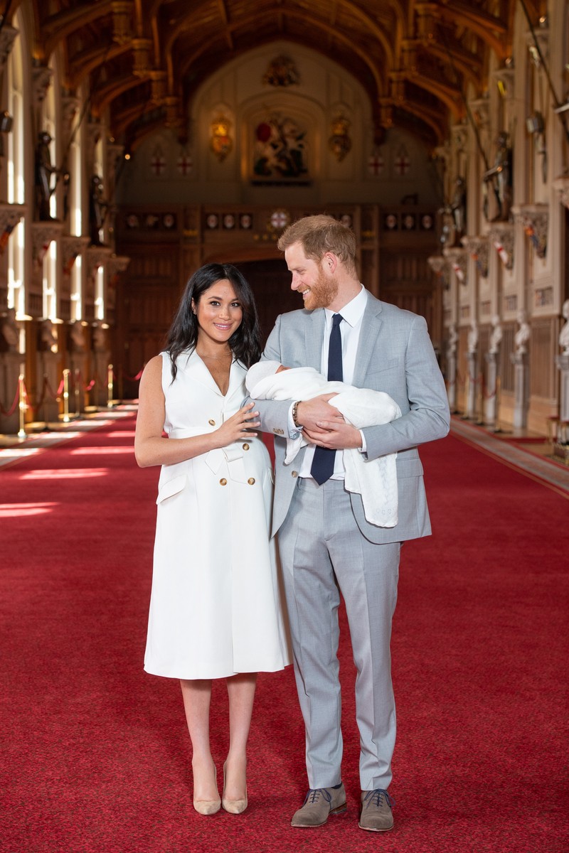 EMBARGOED to 1240 WEDNESDAY MAY 08 2019. The Duke and Duchess of Sussex with their baby son, who was born on Monday morning, during a photocall in St George's Hall at Windsor Castle in Berkshire. May 8, 2019