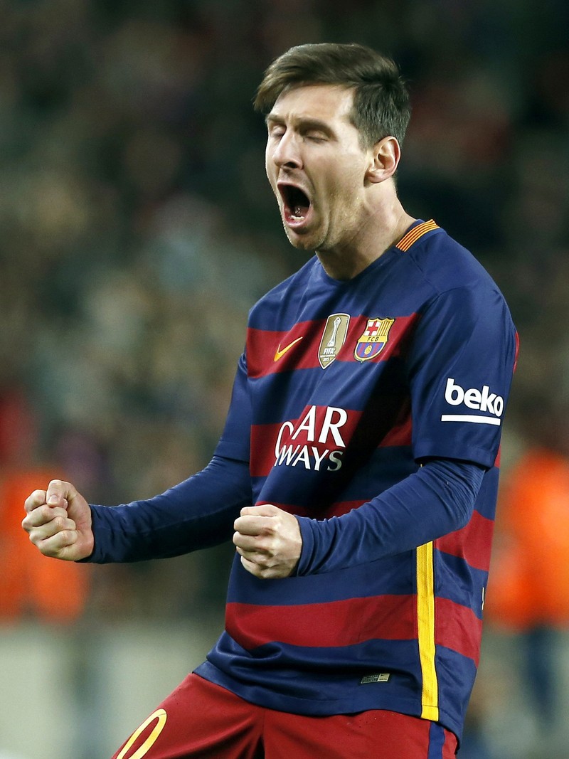 epa05090524 FC Barcelona's Argentinian striker Leo Messi jubilates his second goal against RCD Espanyol during their their Spanish King's Cup first leg match round of 16th played at Camp Nou stadium in Barcelona, Catalonia, Spain on 25 January 2016. EPA/ANDREU DALMAU