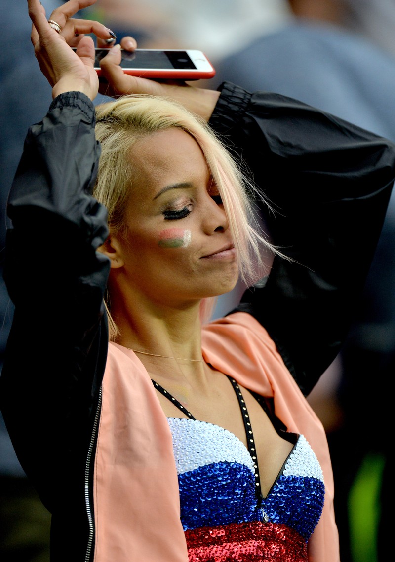 epa06807926 A supporter of Russia during the FIFA World Cup 2018 group A preliminary round soccer match between Russia and Saudi Arabia in Moscow, Russia, 14 June 2018. (RESTRICTIONS APPLY: Editorial Use Only, not used in association with any commercial entity - Images must not be used in any form of alert service or push service of any kind including via mobile alert services, downloads to mobile devices or MMS messaging - Images must appear as still images and must not emulate match action video footage - No alteration is made to, and no text or image is superimposed over, any published image which: (a) intentionally obscures or removes a sponsor identification image; or (b) adds or overlays the commercial identification of any third party which is not officially associated with the FIFA World Cup) EPA-EFE/PETER POWELL EDITORIAL USE ONLY