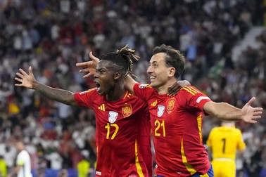 Spain's Mikel Oyarzabal celebrates with Nico Williams, left, after scoring his side's second goal during the final match between Spain and England at the Euro 2024 soccer tournament in Berlin, Germany, Sunday, July 14, 2024.,Image: 889715786, License: Rights-managed, Restrictions: This content is intended for editorial use only. For other uses, additional clearances may be required., Model Release: no, Pictured: Mikel Oyarzabal,Nicholas Williams