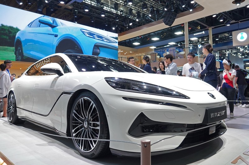 BEIJING, CHINA - MAY 3, 2024 - Visitors look at the Denza Z9GT electric car at the 2024 Beijing International Automotive Exhibition in Beijing, capital of China, May 3, 2024.,Image: 870169332, License: Rights-managed, Restrictions: *** World Rights Except China *** CHNOUT, Model Release: no
