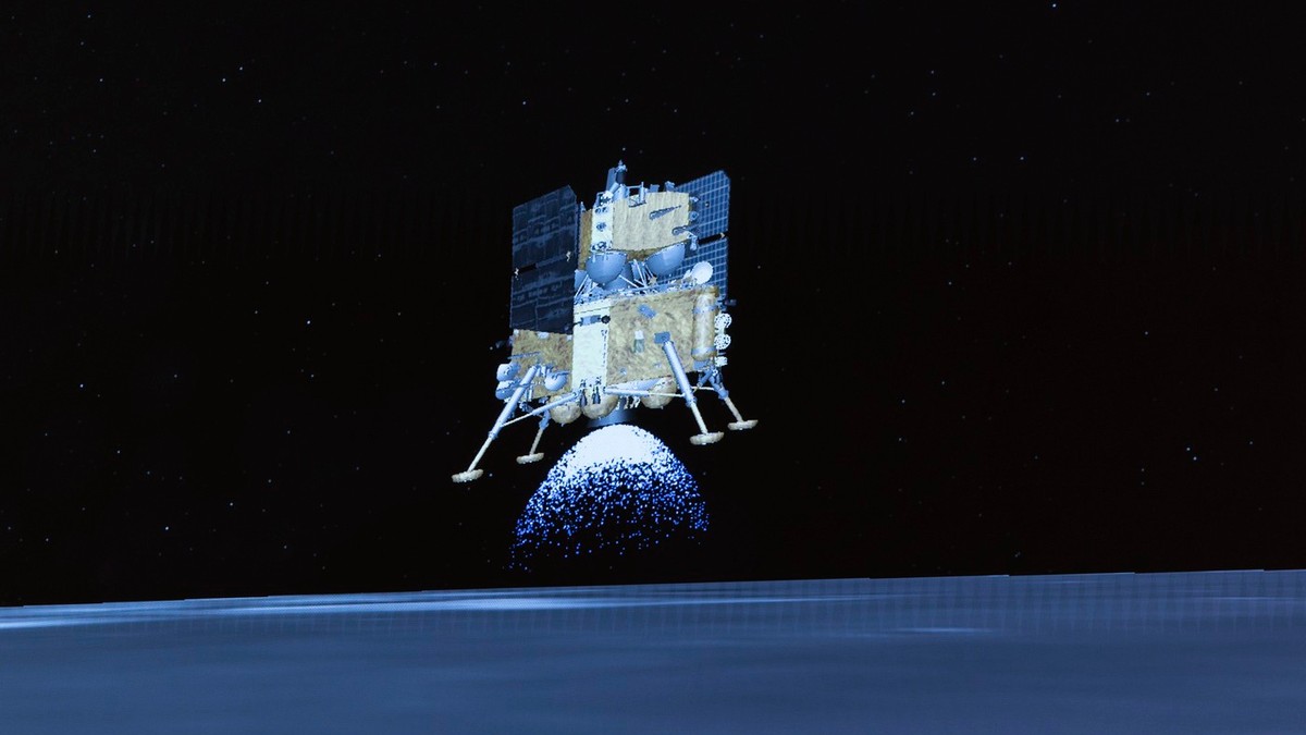 Această imagine preluată dintr-o animație video realizată la Centrul de Control Aerospatial din Beijing (BACC) pe 2 iunie 2024 arată combinația dintre modulul de aterizare și modulul de ascensiune al sondei Chang'e-6 înainte de aterizarea pe partea îndepărtată a Lunii
