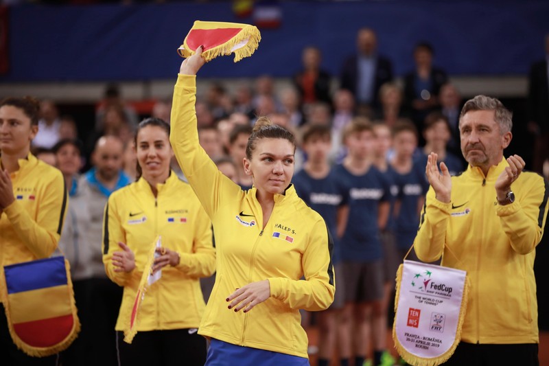 epa07517325 (L to R) Mihaela Buzarnescu, Simona Halep and Florin Segarceanu, headcoach of Romania pose prior to the Fed Cup World Group, Semi Final between France and Romania, in Rouen, France, 20 April 2019. EPA-EFE/CHRISTOPHE PETIT TESSON