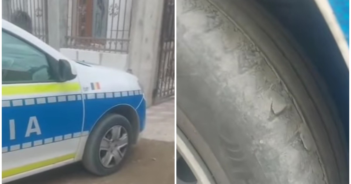 O mașină de poliție care are cauciucurile uzate