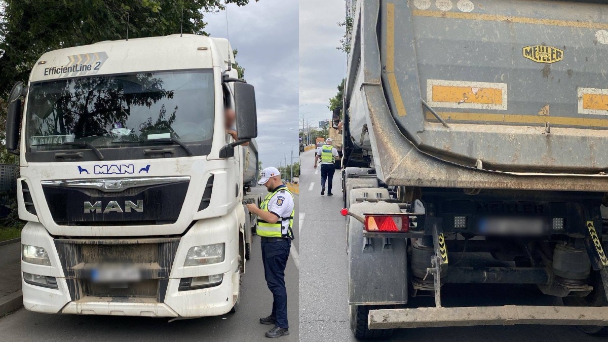 Polițist local care verifică actele unui camion