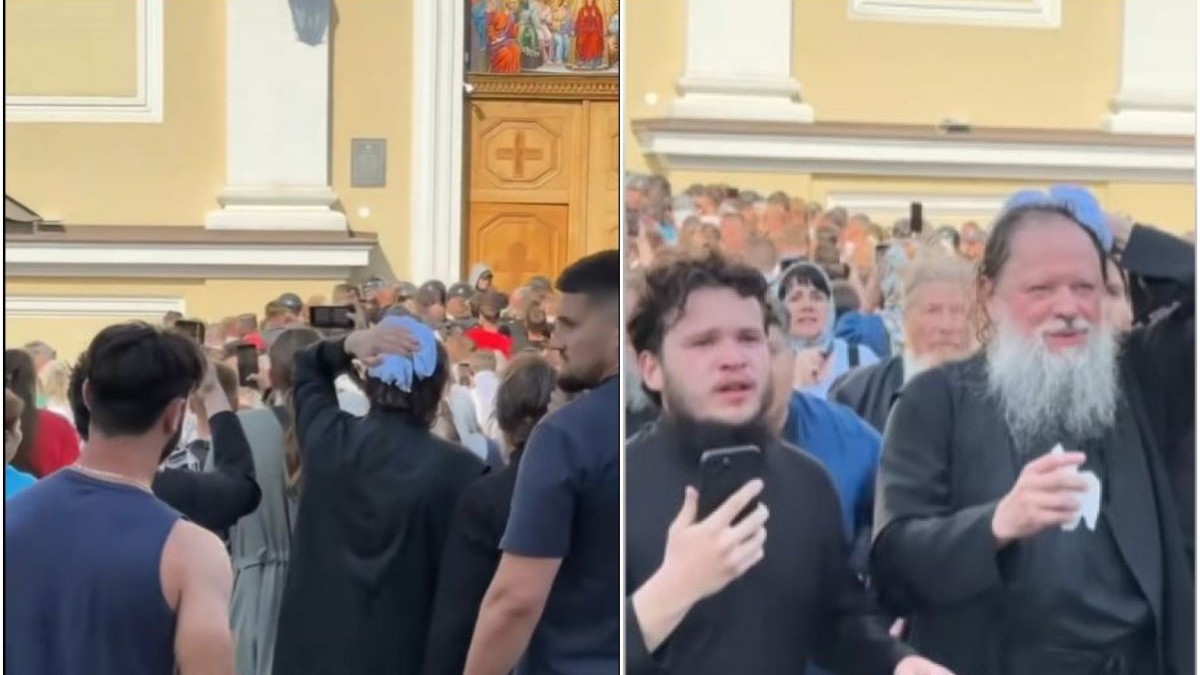 În partea stângă, un preot fotografiat cu spatele își ține mâna pe cap cu o cârpă bleu, după ce a fost rănit, iar în jurul lui sunt mulți oameni în curtea bisericii, unii filmează, după ce a izbucnit un conflict. În dreapta imaginii, un preot își ține mâna pe cap și un șervețel alb în cealaltă mână, iar lîngă el este un tânăr cu un telefon în mână care pare că cere ajutor.