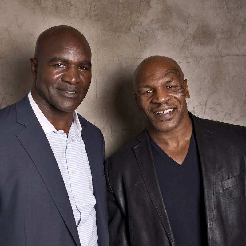 Mike Tyson și Evander Holyfield, foști pugiliști/ Foto: si.com