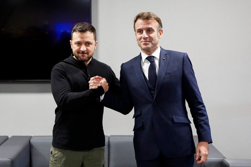 Ukraine's President Volodymyr Zelensky shakes hands with France's President Emmanuel Macron (R) during a bilateral meeting as part of the European Political Community Summit in Budapest, on November 7, 2024.,Image: 931553328, License: Rights-managed, Restrictions: , Model Release: no