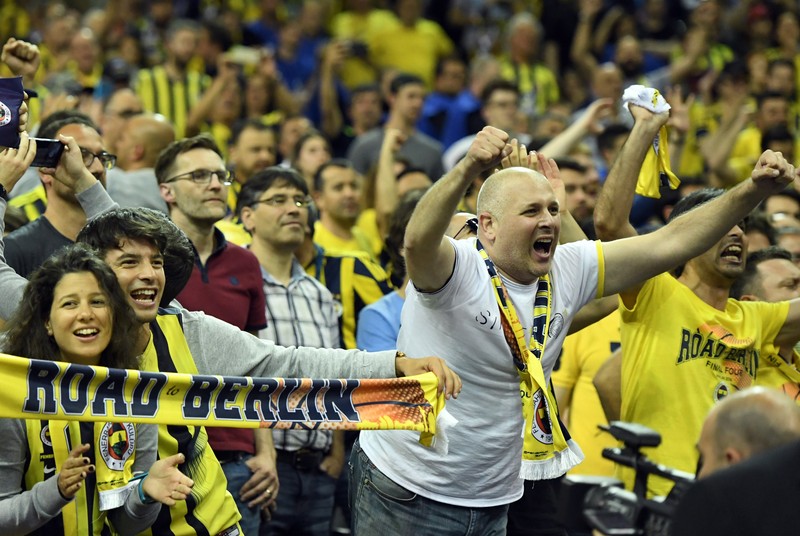 epa05304843 Turkish supporters of Fenerbahce Istanbul cheer during the Euroleague Final Four second semi final basketball match between Fenerbahce Istanbul and Laboral Kutxa Vitoria at Mercedes-Benz Arena in Berlin, Germany, 13 May, 2016. EPA/SOEREN STACHE