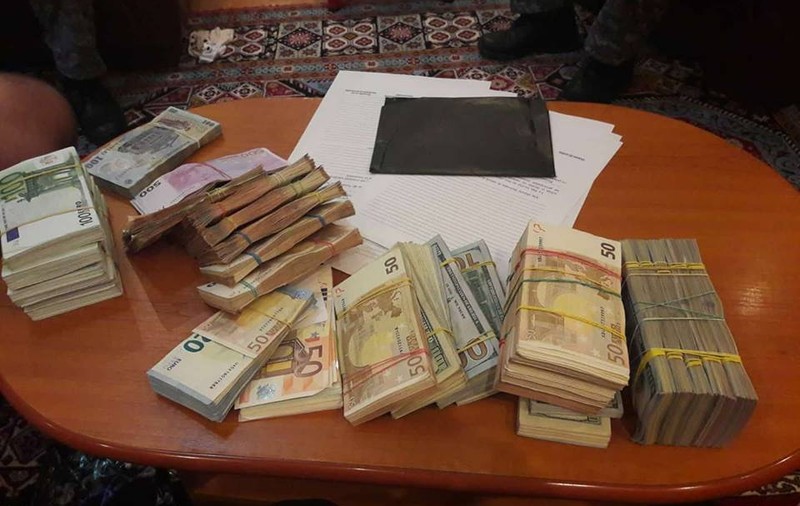 UPDATE | 11 persoane reținute după perchezițiile la case de schimb valutar din București, Ilfov și Constanța