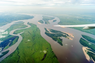 View of the Amur River from the window of a flying plane