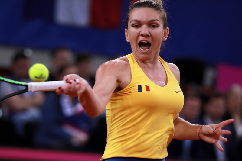 epa07517405  Simona Halep of Romania in action during her game against Kristina Mladenovic of France during the Fed Cup World Group, Semi Final between France and Romania, in Rouen, France, 20 April 2019 EPA-EFE/CHRISTOPHE PETIT TESSON