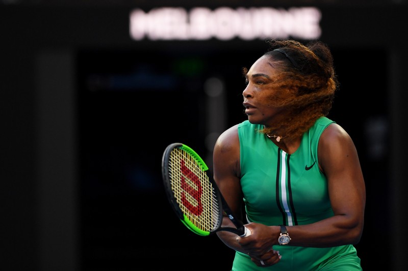 epa07305419 Serena Williams of the USA in action against Simona Halep of Romania during their women's singles fourth round match at the Australian Open Grand Slam tennis tournament in Melbourne, Australia, 21 January 2019. EPA-EFE/LUKAS COCH AUSTRALIA AND NEW ZEALAND OUT