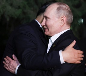 Chinese President Xi Jinping, left, and Russian President Vladimir Putin embrace each other after an informal meeting in Beijing, China, on Thursday, May 16, 2024.,Image: 873619155, License: Rights-managed, Restrictions: This content is intended for editorial use only. For other uses, additional clearances may be required. POOL PHOTO, Model Release: no, Pictured: Vladimir Putin,Xi Jinping