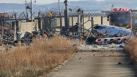 SEOUL, Dec. 29, 2024 -- This photo shows the site of an airplane crash at an airport in Muan, southwest South Korea, on Dec. 29, 2024. At least 28 people were killed in an airplane crash that occurred on Sunday at an airport in southwest South Korea, according to Yonhap news agency and local broadcaster YTN.,Image: 950653796, License: Rights-managed, Restrictions: , Model Release: no