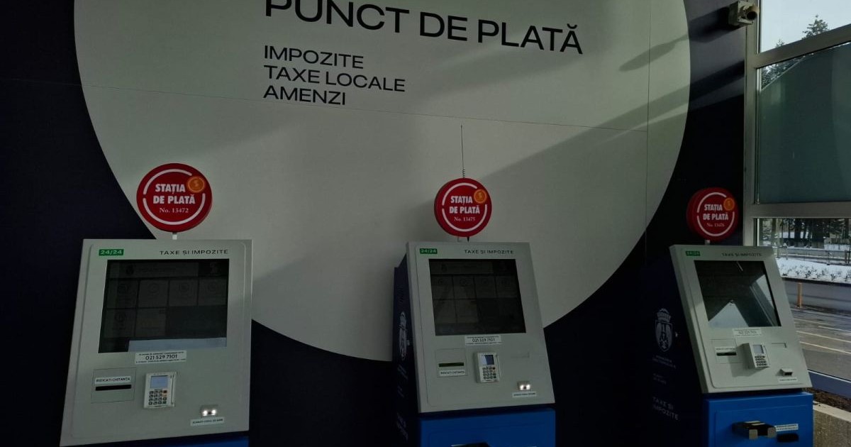 Trei aparate, puse unul lângă altul, la care se pot plăti impozite, taxe și amenzi. Ele sunt în sediul Direcției de taxe și impozite sector 6, București, 13 ianuarie 2026