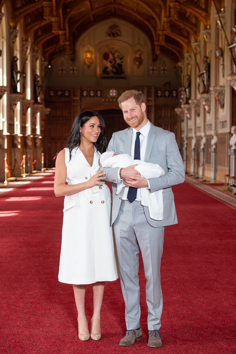 EMBARGOED to 1240 WEDNESDAY MAY 08 2019. The Duke and Duchess of Sussex with their baby son, who was born on Monday morning, during a photocall in St George's Hall at Windsor Castle in Berkshire. May 8, 2019