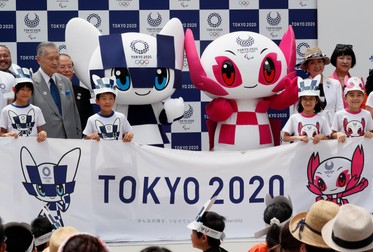 epaselect epa06903680 Tokyo 2020 Olympics mascot Miraitowa (C-L) and Paralympics mascot Someity (C-R) debut in Tokyo, Japan, 22 July 2018 as Yoshiko Mori (L), President of Tokyo 2020 Olympic Committee, and Yuriko Koike (R), Governor of Tokyo, unveil the mascots. Tokyo 2020 Olympics will start on 24 July 2020 through 09 August 2020. EPA-EFE/KIMIMASA MAYAMA