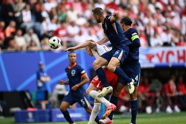 HAMBURG, GERMANY - JUNE 16: Stefan de Vrij (6) of Netherlands in action against Adam Buksa (16) during the 2024 European Football Championship (EURO 2024) Group D football match between Poland and Netherlands at Volksparkstadion Hamburg in Hamburg, Germany on June 16, 2024. Halil Sagirkaya / Anadolu/ABACAPRESS.COM