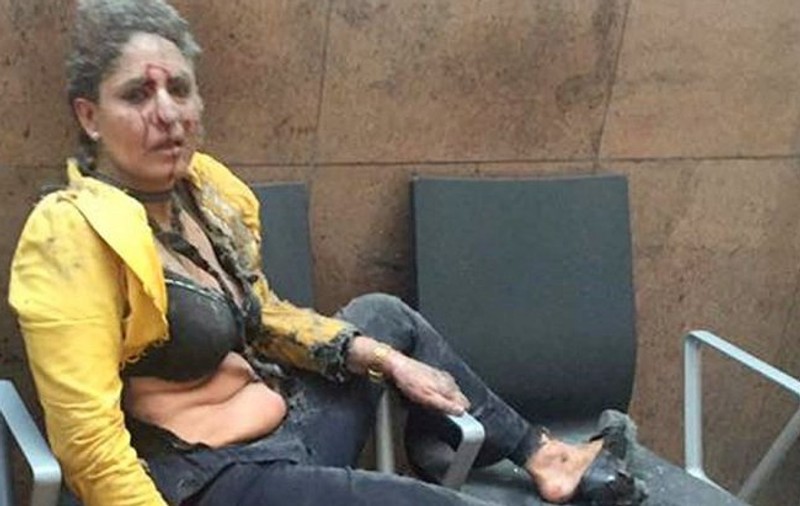 ATENTATE LA BRUXELLES S-a aflat cine este femeia din prima poză apărută după atentatele din Bruxelles! Imaginea cu ea a făcut înconjurul lumii