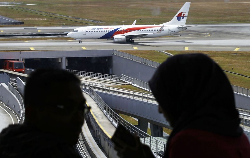 Malaysia anunţă că 25 de ţări participă la căutarea extinsă a zborului MH370
