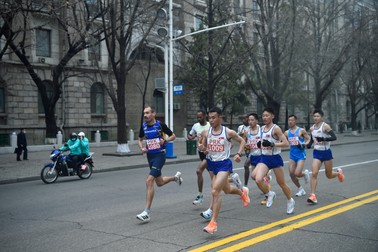 Participants take part in the 31st Pyongyang International Marathon in Pyongyang on April 6, 2025, as part of celebrations marking the birth of North Korea's founding leader Kim Il Sung in 1912. The last edition of the Pyongyang Marathon was held in 2019 before the pandemic, during which the nuclear-armed state sealed its borders in an effort to contain the virus.,Image: 984274070, License: Rights-managed, Restrictions: , Model Release: no