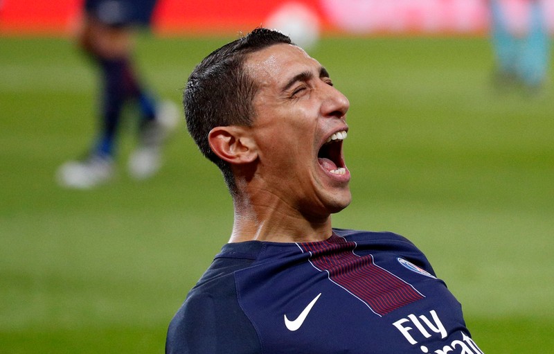 epa05592607 Angel Di Maria of Paris Saint Germain celebrates scoring the 1-0 opening goal against FC Basel during the UEFA Champions League group A soccer match between Paris Saint Germain (PSG) and FC Basel at Parc des Princes stadium in Paris, France, 19 October 2016. EPA/YOAN VALAT