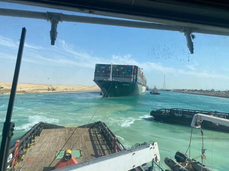 epa09105075 A handout photograph made available by the Syez Canal Authority shows the Ever Given container ship after it was refloated in the Suez Canal, Egypt, 29 March 2021. The head of the Suez Canal Authority announced on 29 March that the large container ship, which ran aground in the Suez Canal on 23 March, is now free floating after responding to the pulling maneuvers. EPA-EFE/SUEZ CANAL AUTHORITY / HANDOUT HANDOUT EDITORIAL USE ONLY/NO SALES
