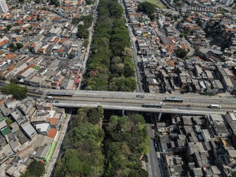 This aerial view shows the Tiquatira Linear Park --officially named Tiquatira Linear Park Engineer Werner Eugenio Zulauf-- in Sao Paulo, Brazil, on September 4, 2024. In little more than two decades, Helio da Silva has planted more than 40,000 trees -160 different species- in the 3.2 kilometre long and about 100 metres wide plot of land amid the concrete in Sao Paulo, a green gift to the megalopolis in times of climate crisis.,Image: 911531154, License: Rights-managed, Restrictions: TO GO WITH AFP STORY by Rodrigo ALMONACID, Model Release: no