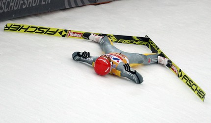 epa06416587 Richard Freitag of Germany reacts after falling during the third stage of the 66th Four Hills Tournament in Innsbruck, Austria, 04 January 2018. EPA-EFE/LISI NIESNER