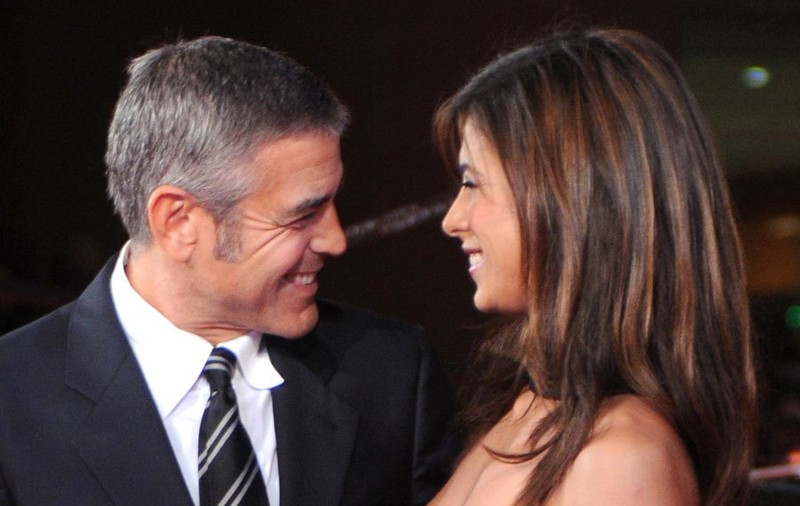 George Clooney şi Elisabetta Canalis, sărut pasional în public