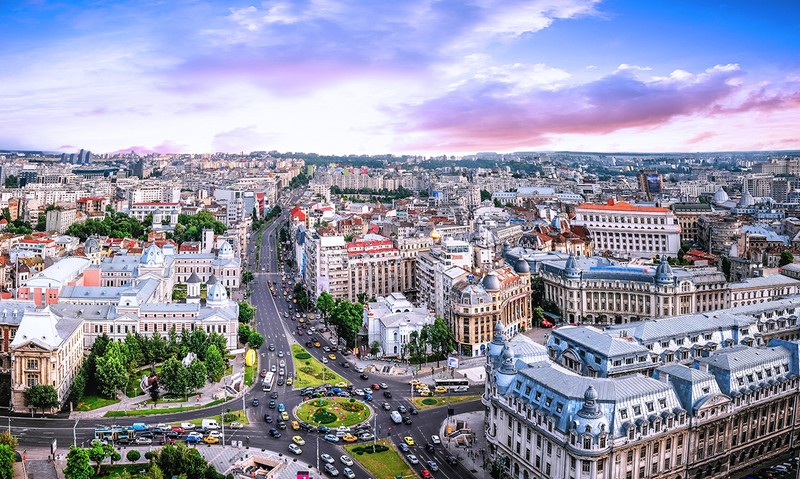 180 Degrees aerial panorama of the capital city of Romania, Bucharest. Blue sky above the center of the city.