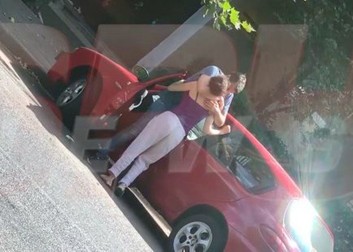 Adriana Titieni, și Alexandru papadopol au fost surprinși îmbrățișîndu-se pe stradă (FOTO: spynews.ro)