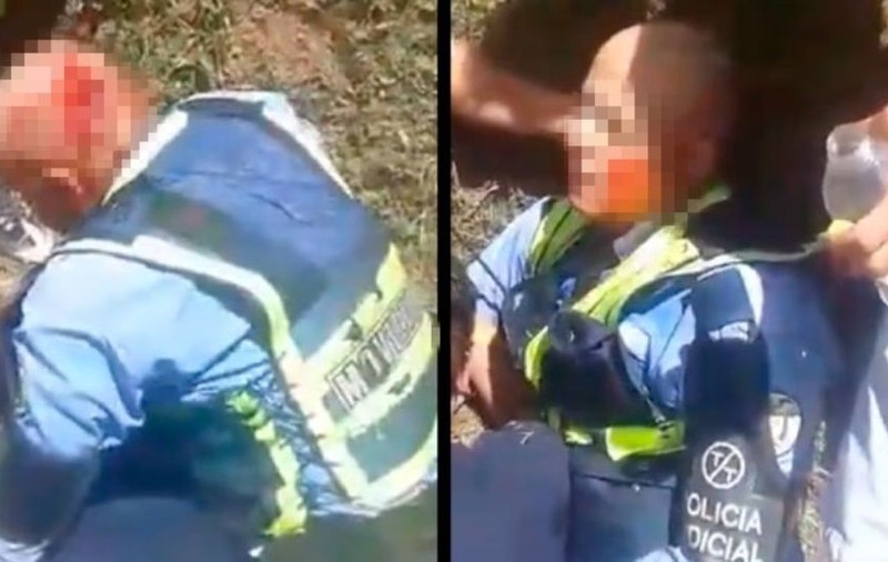 Un agent de poliție, atacat cu toporul de un șofer pe care l-a amendat
