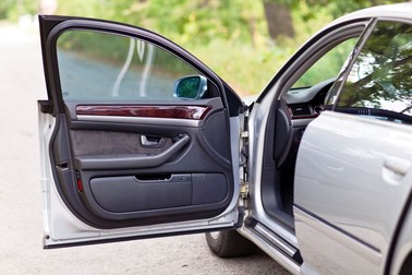 The front open door of modern luxury car.