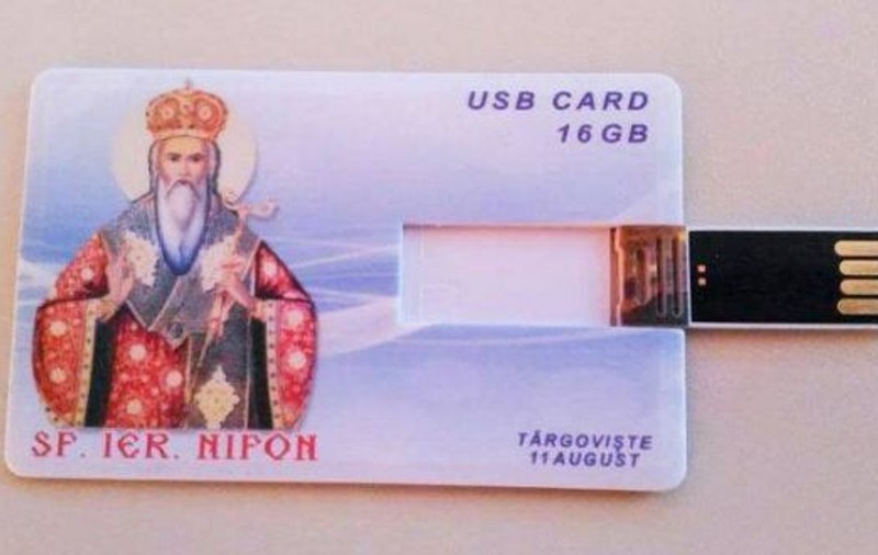 Arhiepiscopia Târgoviştei le-a făcut credincioșilor un cadou inedit: stick-uri de 16 GB cu chipul unui sfânt | FOTO