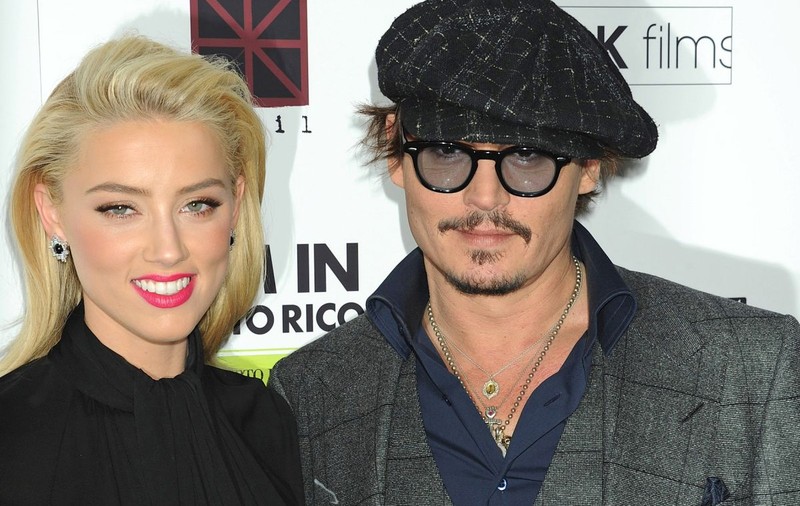 Johnny Depp spune că Amber Heard, fosta sa soție, s-a prezentat la tribunal cu ”vânătăi desenate”
