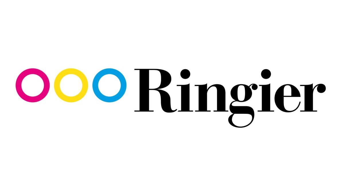 Logo-ul companiei Ringier cu trei cercuri de culoare roz, galben și albastru, apoi textul Ringier cu litere negre