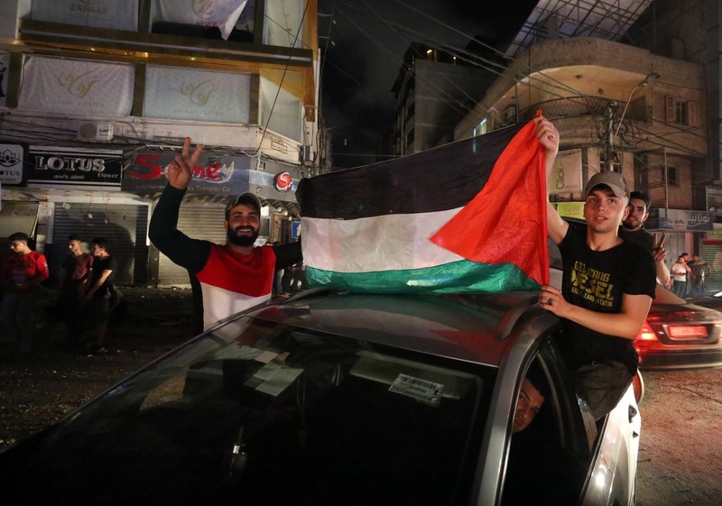 Palestinienii au ieșit în număr mare pe străzi, după anunțarea încetării focului între Hamas și Israel | Foto: Profimedia