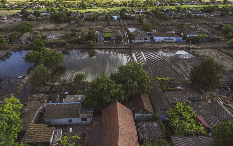 MYKOLAIV, UKRAINE - JUNE 15: An aerial view of damaged houses after flooding in Mykolaiv, Ukraine on June 15, 2023. More than 70 houses in the Vasylivka have been rendered unusable due to flooding following the destruction of the Kakhovka Dam and Hydroelectric Power Plant (HPP) in Ukraine. Following the destruction of the Kakhovka HPP in the Kherson region of Ukraine last week, the Inhulets River, which flows into the Dnieper River and is located next to the settlements in the Mykolaiv region, also overflowed. Ercin Erturk / Anadolu Agency/ABACAPRESS.COM,Image: 784050307, License: Rights-managed, Restrictions: , Model Release: no