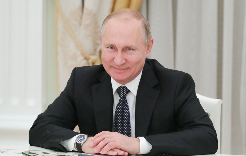 Putin îl laudă pe Trump pentru politica antimigrație și o critică pe Merkel