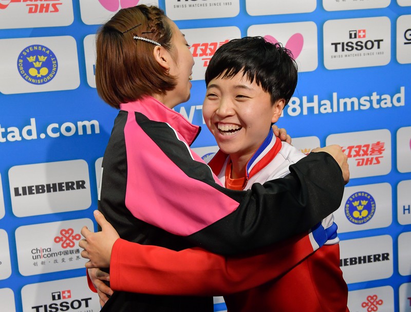 epa06708483 Song I Kim (R) of North Korea and Hyowon Suh of South Korea pose for media at the Table Tennis Team World Championships in Halmstad, Sweden, 03 May 2018. North Korea and South Korea told the organisers that they do not want to compete against each other in the women's quarter final of the Table Tennis Team World Championships here in Halmstad but form a unified Korean Team. EPA-EFE/JONAS EKSTROMER SWEDEN OUT