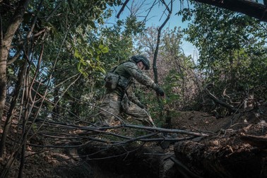 DONETSK OBLAST, UKRAINE - JULY 23: Oleksander, a 28-year-old Ukrainian soldier from the 121st brigade runs to settle a FPV drone loaded with explosives to strike into Russian positions in Pokrovsk area, Ukraine on July 23, 2024. Pablo Miranzo / Anadolu/ABACAPRESS.COM
