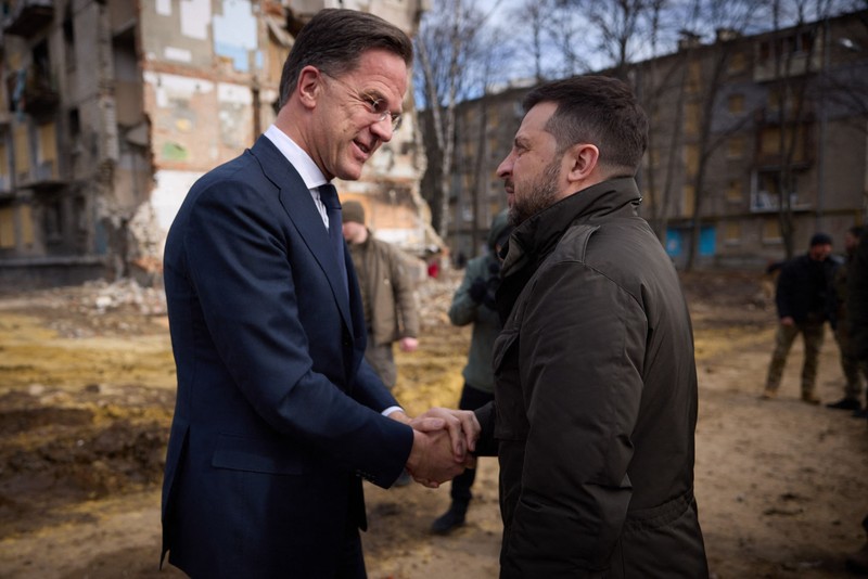Handout photo shows Ukrainian President Volodymyr Zelensky greeting Prime Minister of the Netherlands Mark Rutte as they inspect damaged buildings in Kharkiv, Ukraine, March 1, 2014. Photo by Ukrainian Presidency via ABACAPRESS.COM