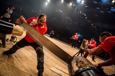 Team Poland performs during the team competition of the Stihl Timbersports World Championship at the Olympiahall in Innsbruck, Austria on November 14, 2014.