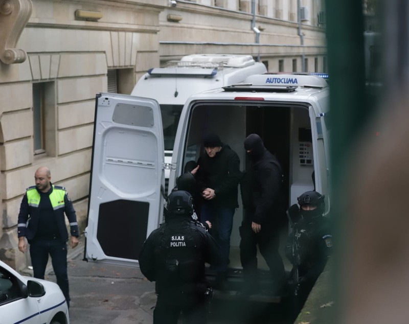 Horațiu Potra, păzit de un comando de mascați. Șeful mercenarilor a fost adus la Curtea de Apel București, alături de fiul și nepotul său