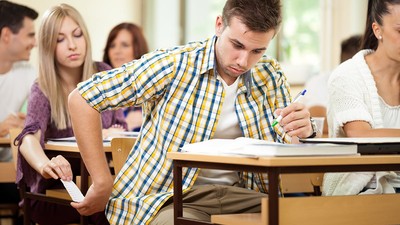 Students cheating with cheat sheet